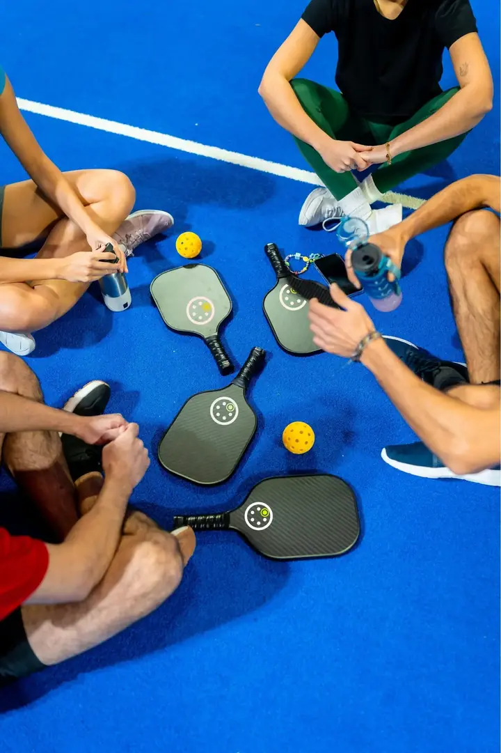Players sitting together after an open play session